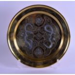A CAIROWARE SILVER AND COPPER INLAID BRASS DISH decorated with stylised motifs. 24 cm diameter.