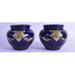 A PAIR OF AUSTRIAN ART NOUVEAU MAJOLICA PLANTERS with removable inserts, marked Wilhelm Schiller &
