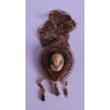 A VICTORIAN HAIR CAMEO PENDANT.