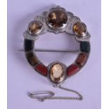 A GOOD SCOTTISH SILVER CITRINE AND PEBBLE STONE BROOCH.