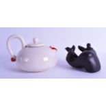 AN UNUSUAL 1980S FITZ AND FLOYD LIP SERVICE NOVELTY TEAPOT together with another teapot in the