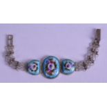 A SILVER AND ENAMEL LADIES FLORAL BRACELET.