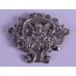 AN ART NOUVEAU SILVER CHERUB BROOCH.