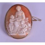 A LARGE MID VICTORIAN CARVED CAMEO BROOCH depicting a classical female with child. 4.25 cm x 6 cm.