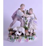 A 19TH CENTURY GERMAN SITZENDORF PORCELAIN FIGURAL GROUP depicting a male and female standing beside