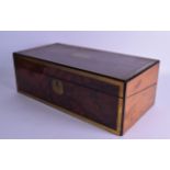 A LARGE MID 19TH CENTURY WALNUT CAMPAIGN WRITING BOX with brass mounts, the top rising to reveal a