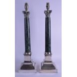 A PAIR OF ELECTRO PLATE AND MARBLE CORINTHIAN COLUMN CANDLE STICKS converted to lamps. Stamped AW.