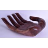 A LARGE CARVED HARDWOOD NOVELTY HAND. 38 cm long.