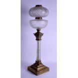 A LARGE 19TH CENTURY CARVED CRYSTAL AND BRONZE OIL LAMP in the form of a corinthian column, upon a