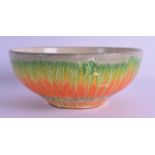 AN ART DECO ENGLISH LAVA GLAZED POTTERY BOWL with orange and green painted decoration. 20 cm