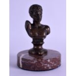 A 19TH CENTURY ITALIAN GRAND TOUR BRONZE BUST OF A ROMAN MALE modelled upon a veined marble