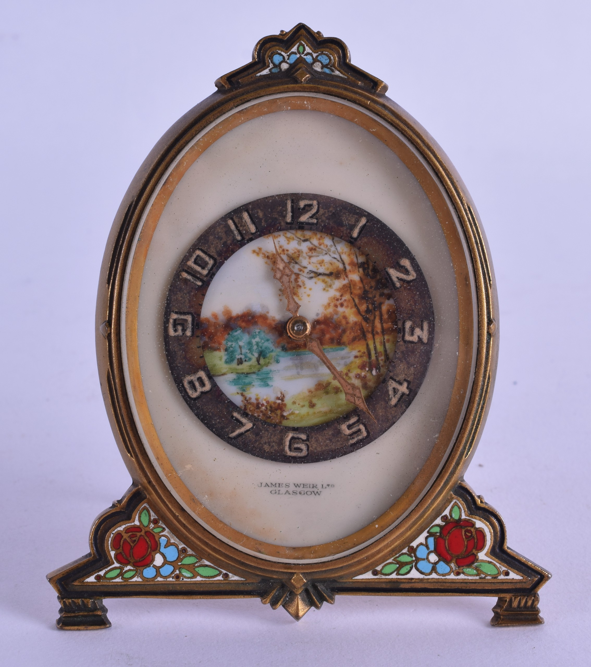 AN EARLY 20TH CENTURY FRENCH CARVED PAINTED IVORY STRUT CLOCK decorated with a landscape, encased