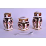 A ROYAL CROWN DERBY THREE PIECE IMARI CRUET SET comprising of mustard pot, salt, pepper & spoon. (