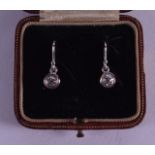 A PAIR OF PLATINUM AND DIAMOND EARRINGS.
