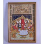 A FINE 19TH CENTURY INDIAN FRAMED PAINTED AND JEWELLED IVORY PANEL depicting royalty beside two