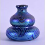 A STYLISH OKRA IRIDESCENT GLASS VASE made for Oskar Karla. 7.75 cm high.