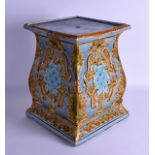 A 19TH CENTURY CONTINENTAL POTTERY GARDEN SEAT of square form, decorated with scrolling vines and