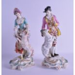 A PAIR OF 18TH CENTURY DERBY PORCELAIN FIGURAL GROUPS modelled upon scrolling gilt and turquoise