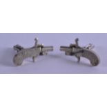 A RARE PAIR OF ANTIQUE 2MM BERLOQUE PISTOL CUFFLINKS.