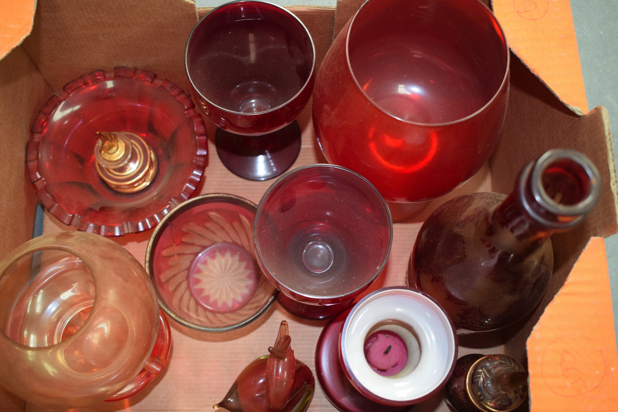 A COLLECTION OF RUBY GLASS WARE together with a Bohemian decanter. (qty)