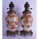 A PAIR OF 19TH CENTURY JAPANESE MEIJI PERIOD SATSUMA VASES converted to oil lamps. 44 cm high.