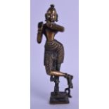 AN 18TH CENTURY INDIAN BRONZE FIGURE OF A BUDDHISTIC MALE modelled with silver eyes, upon a