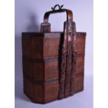 A LARGE CHINESE QING DYNASTY CARVED BAMBOO THREE TIER STACKING BASKET AND COVER with engraved