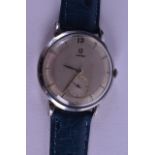 A VINTAGE OMEGA WRISTWATCH with silvered dial. 3 cm diameter.