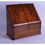 A LATE VICTORIAN BURR WALNUT DESK STATIONARY CABINET with folding doors revealing a fitted interior.