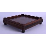 A 19TH CENTURY CHINESE CARVED HARDWOOD SQUARE FORM STAND with raised lip. 20.5 cm square.