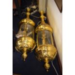 A HUGE PAIR OF MID 20TH CENTURY BRASS WALL LANTERNS of neo classical inspiration.