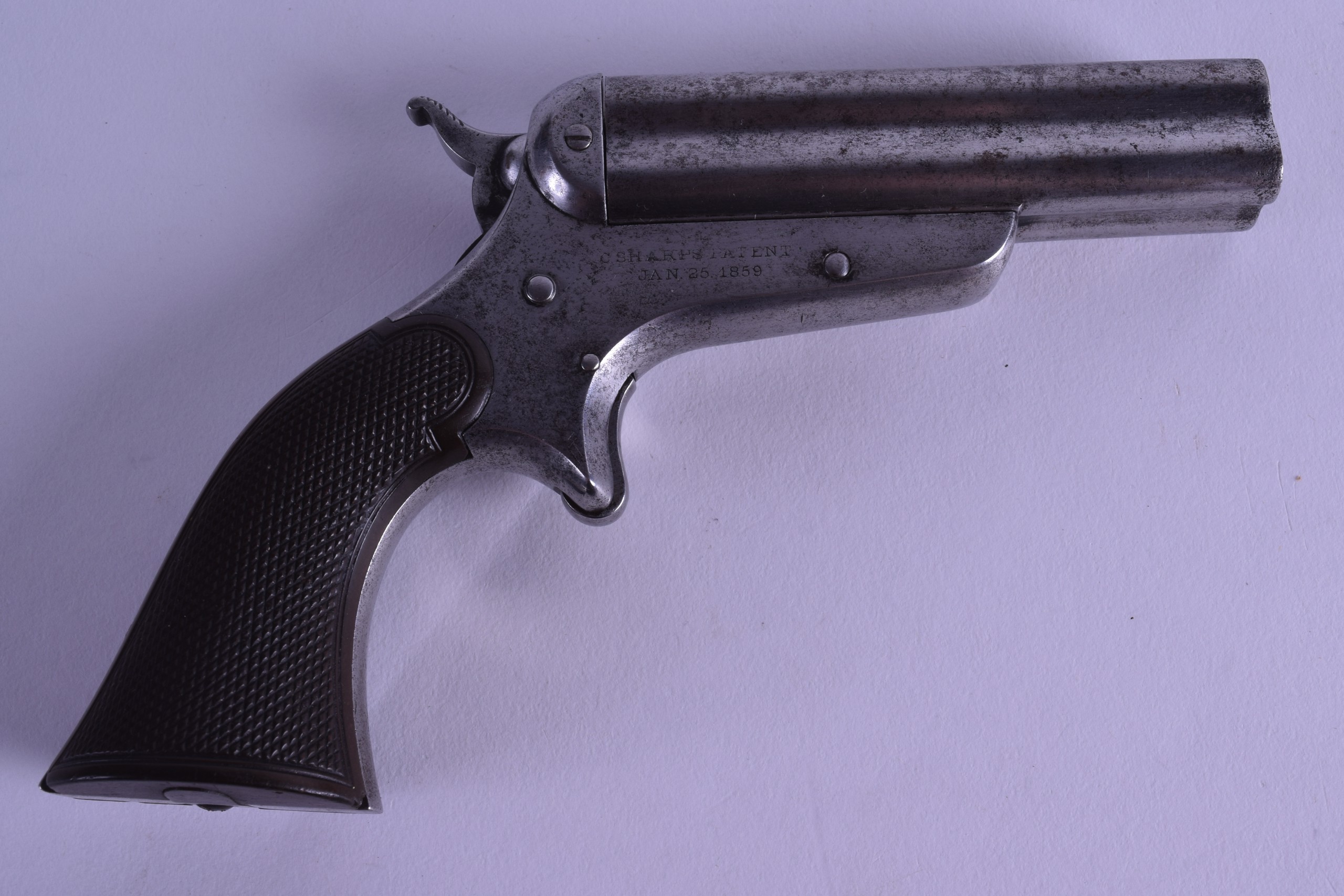 A MID 19TH CENTURY SHARPS PATENT FOUR BARREL PERCUSSION PISTOL January 25th 1859. 15 cm x 9.5 cm.