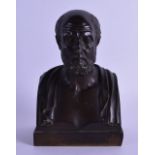 A 19TH CENTURY EUROPEAN BRONZE BUST OF A SCHOLAR modelled in open robes upon a square base. 17 cm