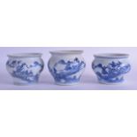 A SET OF THREE CHINESE CA MAU CARGO BLUE AND WHITE JARLETS painted with landscapes. 8.5 cm wide. (