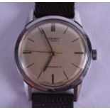 A GENTLEMANS PEEREX STAINLESS STEEL WRISTWATCH. 3 cm diameter.