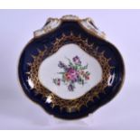 AN 18TH CENTURY WORCESTER BLUE SCALE PORCELAIN DISH painted with floral sprays and gilt. 19 cm