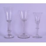 A GROUP OF THREE GEORGE III GLASSES each with variants on the spiral twist columns. Largest 19.5