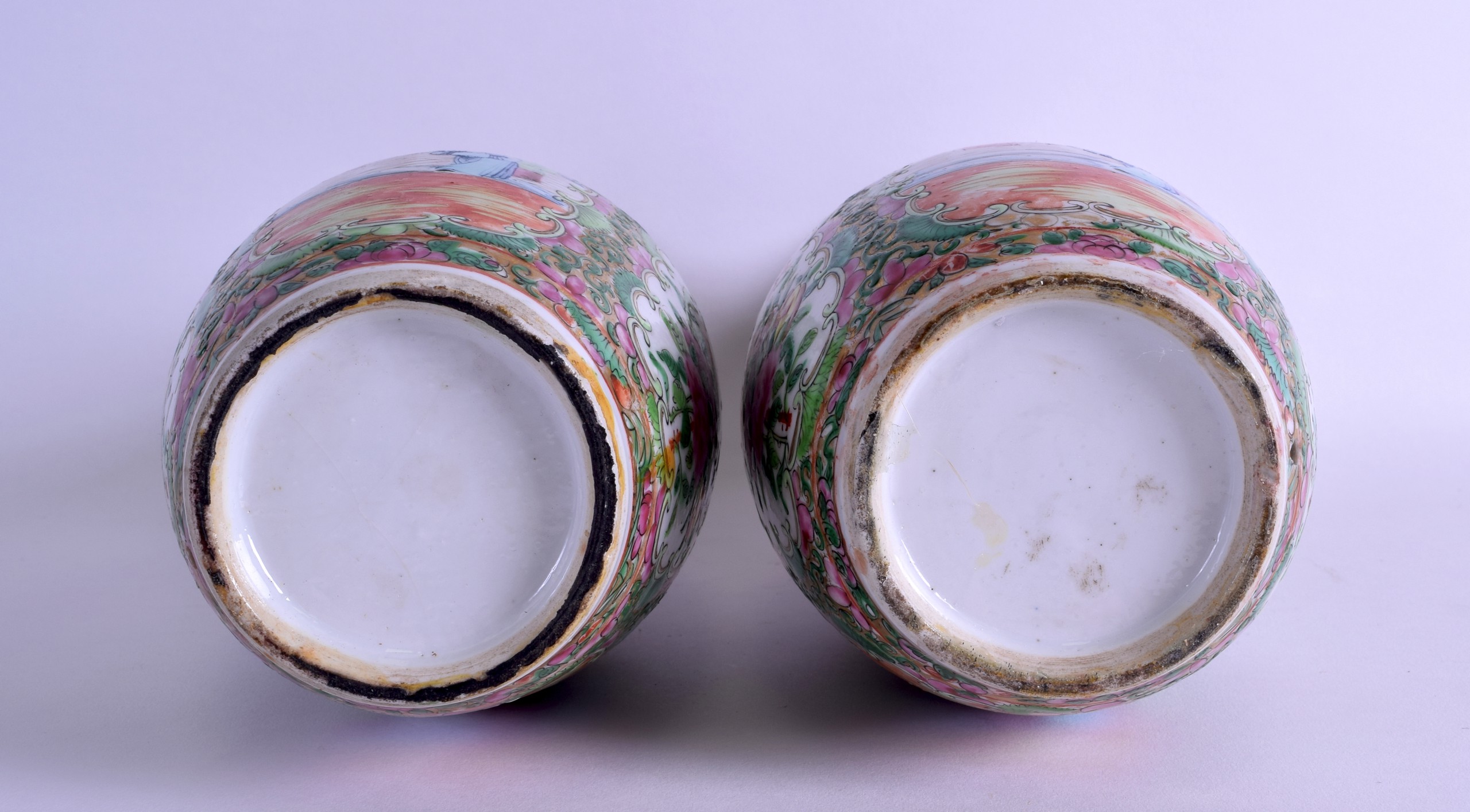 A PAIR OF 19TH CENTURY CHINESE CANTON FAMILLE ROSE VASES painted with figures and birds within - Image 3 of 3