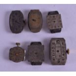 A GROUP OF SIX VINTAGE ROLEX WATCH DIALS and movements, one circular, two oval and three