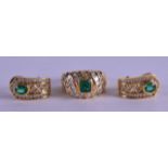 AN 18CT YELLOW GOLD EMERALD AND DIAMOND RING with matching earrings. 25.8 grams. (3)