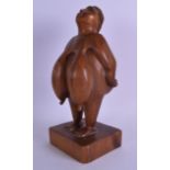 AN UNUSUAL 1970S PALEOLITHIC VENUS FORM WOODEN SCULPTURE. Signed. 32 cm high.