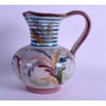 AN UNUSUAL MID 20TH CENTURY ENGLISH POTTERY JUG Attributed to Denby, painted with stylised