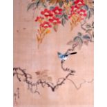 AN EARLY 20TH CENTURY CHINESE FRAMED WATERCOLOUR ON SILK depicting a bird perched amongst foliage.