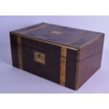 A MID 19TH CENTURY WALNUT CAMPAIGN WRITING BOX with twin brass strap banding and fitted interior. 34