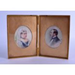 Magda Heuermann (1858-1962) A Pair of late 19th century painted ivory portrait miniatures,