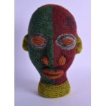 AN EARLY 20TH CENTURY AFRICAN BAMILEKE BEADED TERRACOTTA MASK decorated with red, green, yellow