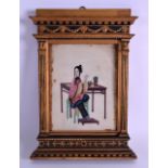 A FRAMED MID 19TH CENTURY CHINESE PITH PAPER WORK depicting a female beside a hardwood table,