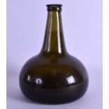 AN 18TH CENTURY GREEN GLASS ONION BOTTLE of bulbous form. 19.5 cm high.