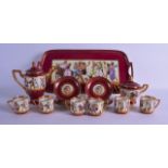 AN EARLY 20TH CENTURY VIENNA PORCELAIN COFFEE SET ON TRAY decorated with classical figures upon a