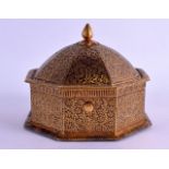 A FINE 18TH/19TH CENTURY ISLAMIC OR CENTRAL ASIAN OCTAGONAL IRON BOX AND COVER gilded all over